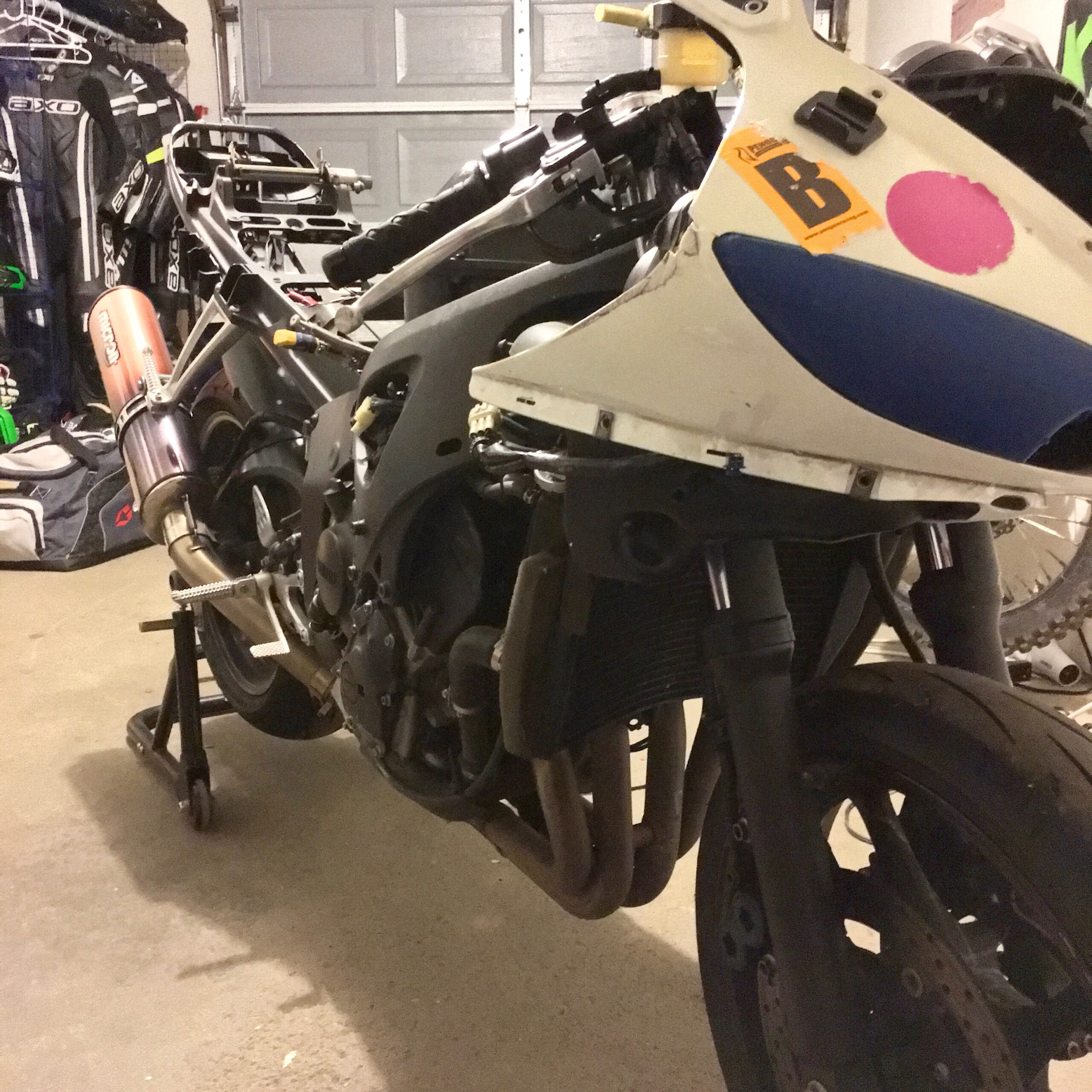 Getting the motorcycle street ready again.